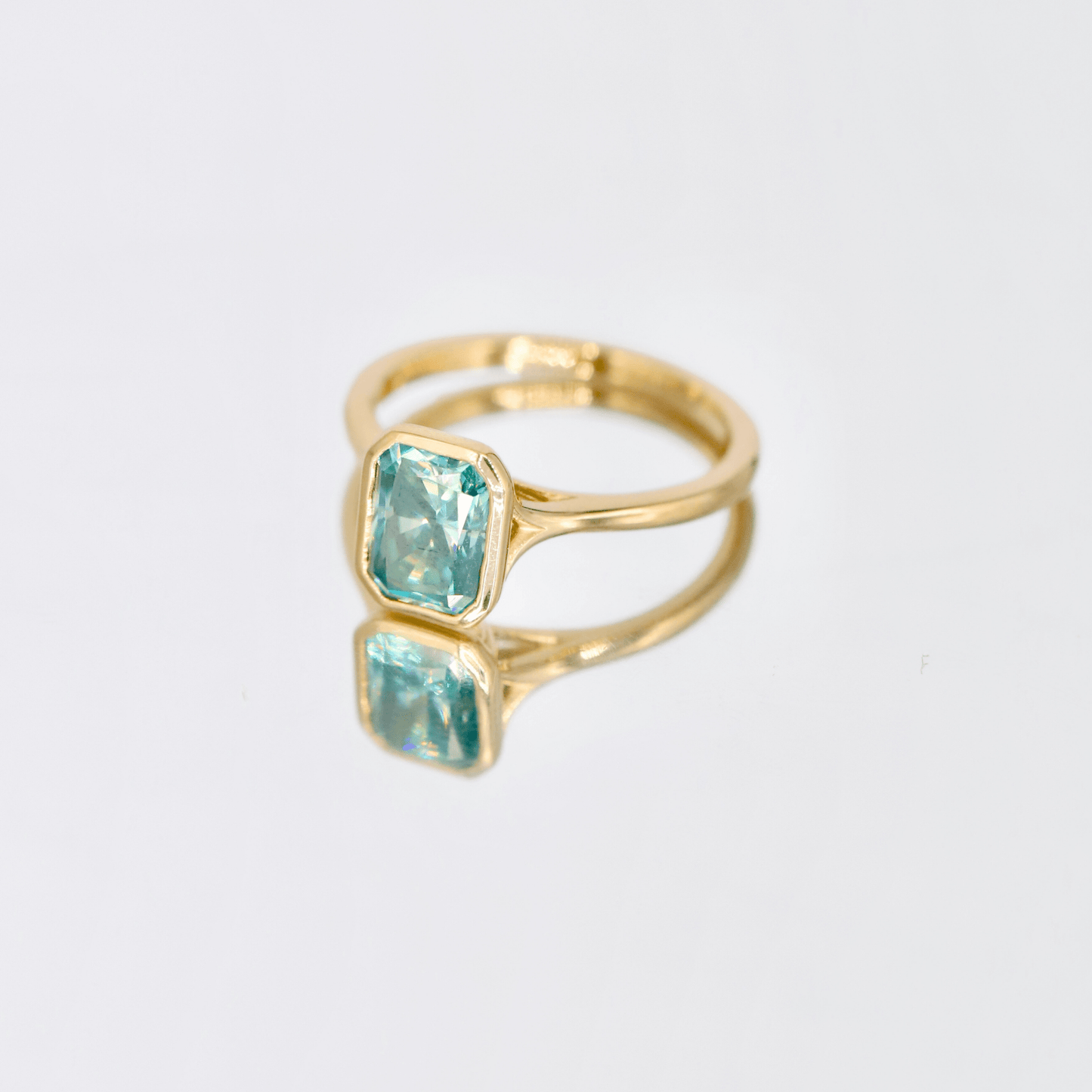 Lu & Lo radiant cut moissanite ring in bezel setting,