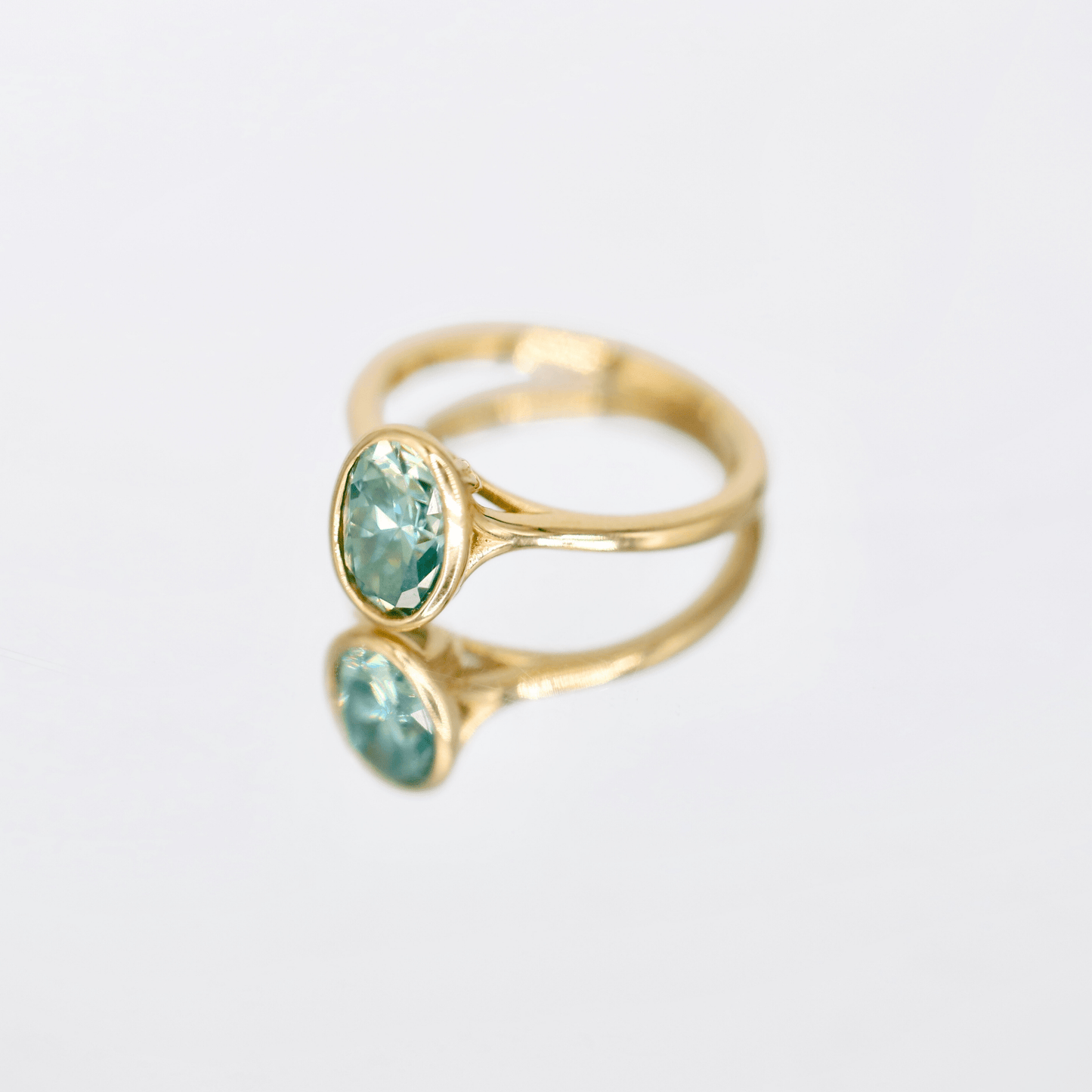 Alina | Bezel-Set Oval Cut Blue Moissanite Ring - Lu and Lo Jewellery