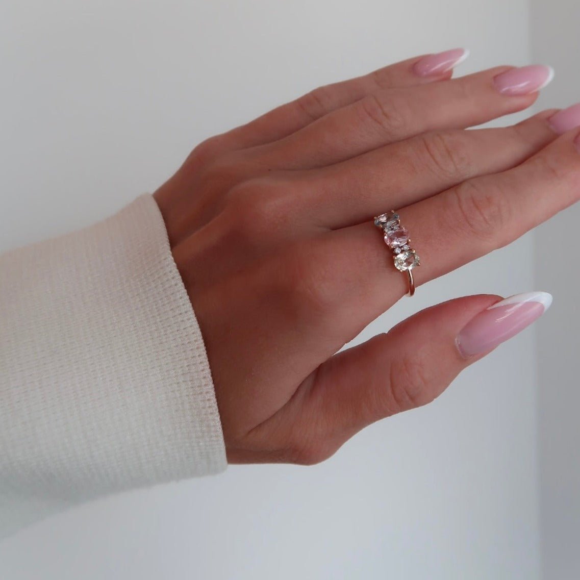 Wearing Softest Hue Unicorn Sapphire Ring - 1