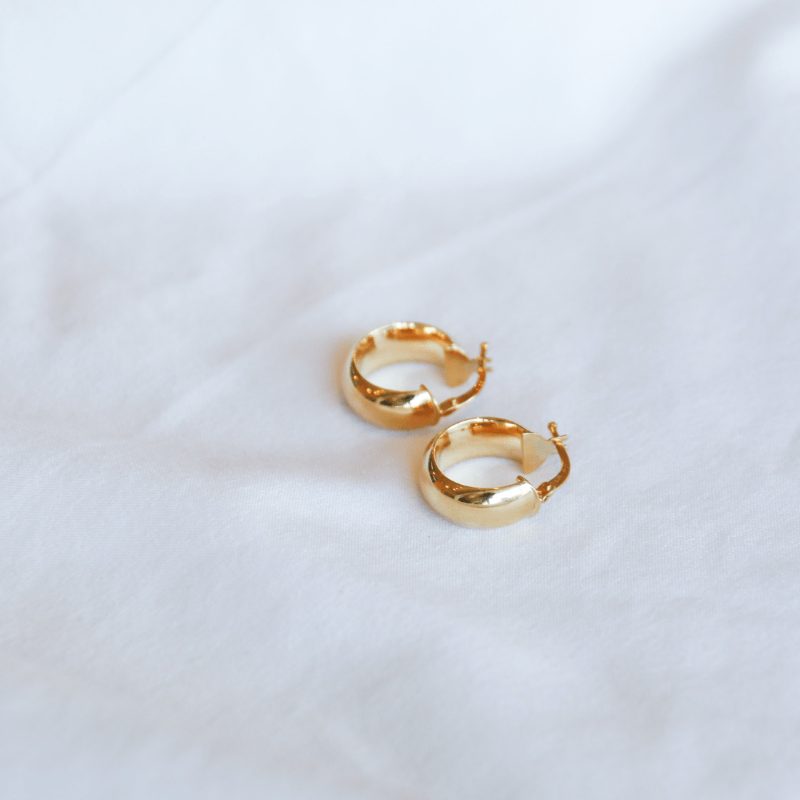 Bold Huggie Hoops Earrings - Close View 1