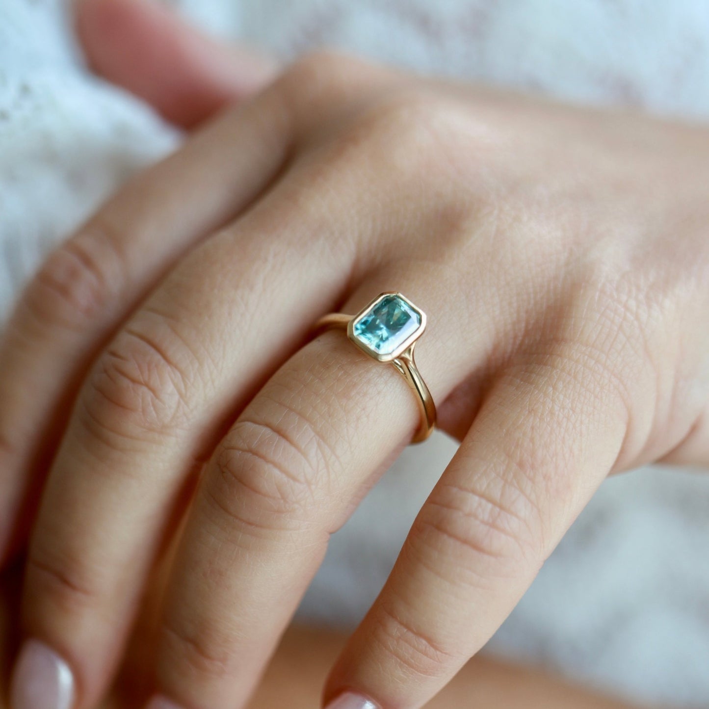 Lu & Lo ring with bezel-set radiant cut moissanite stone