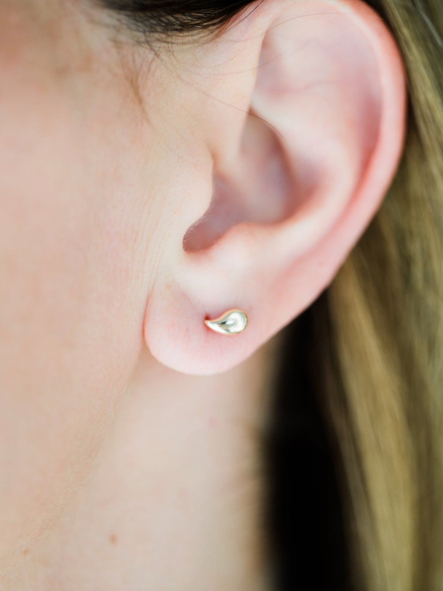 Wearing Mini Birdie Studs
