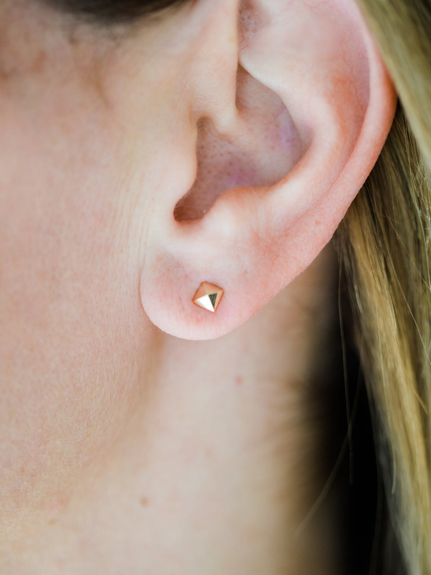 Wearing Mini Peak Studs