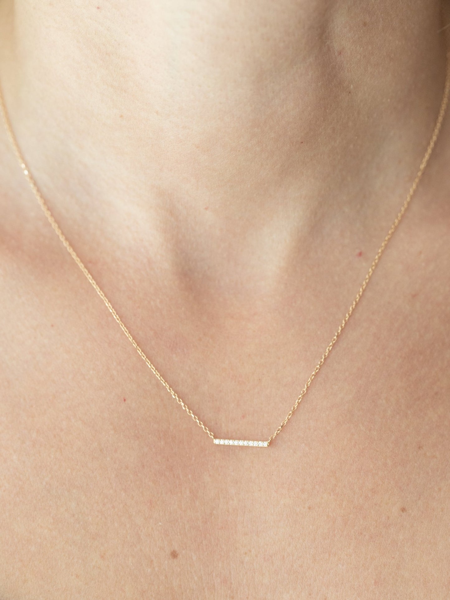 Wearing Dainty Diamond Horizontal Bar Necklace