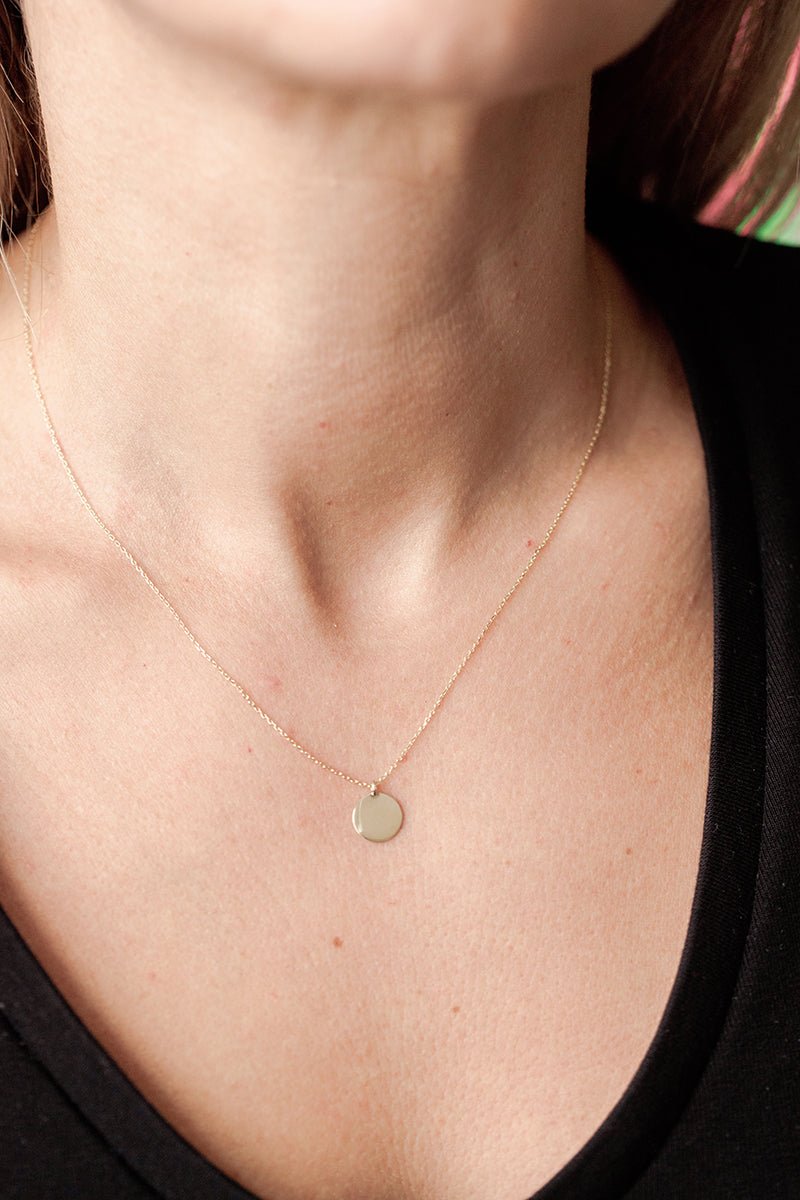 Wearing Mini Disc Necklace