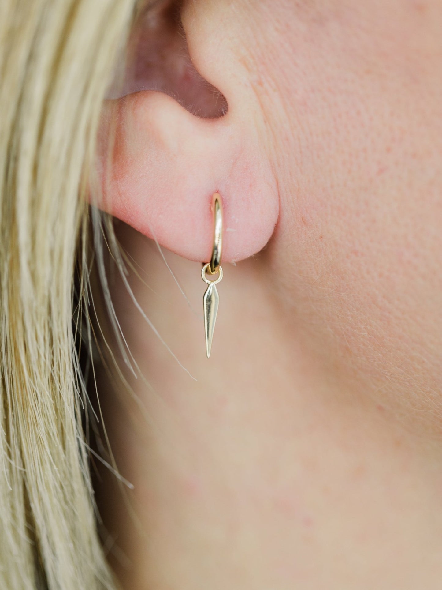 Wearing Spike Drop Huggie Earrings