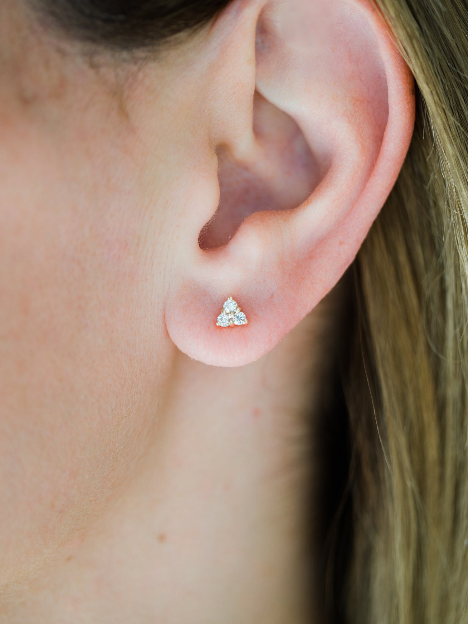 Wearing Trio Diamond Studs