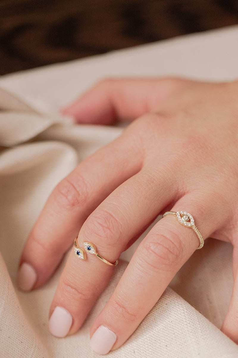 Wearing Double Mini Evil Eye Diamond and Blue Sapphire Ring